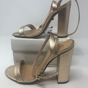 Schultz stacked heel sandals.